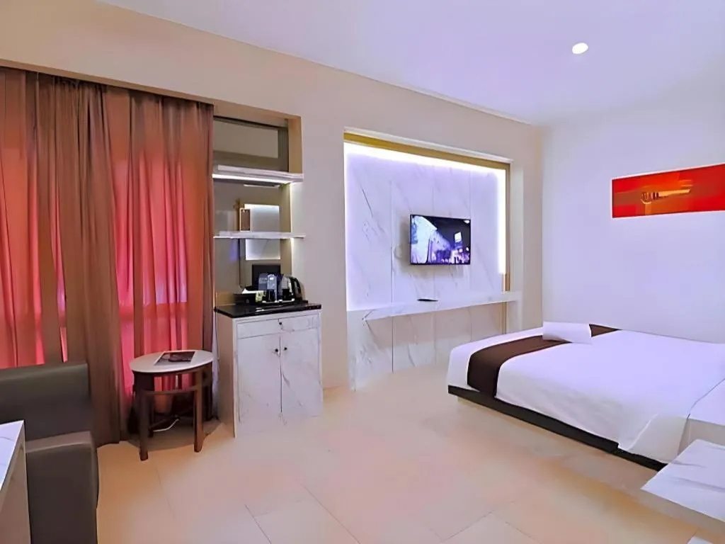 Bed in Grand Malioboro Yogyakarta