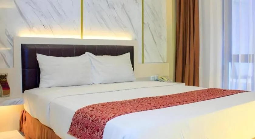 Bed in Grand Malioboro Yogyakarta