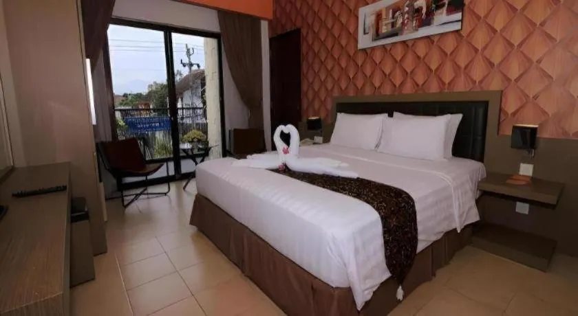 Bed in Grand Malioboro Yogyakarta