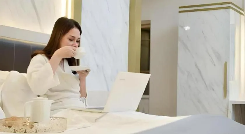 Bed in Grand Malioboro Yogyakarta