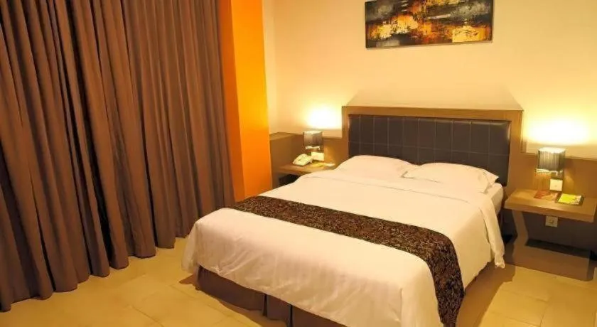 Bed in Grand Malioboro Yogyakarta