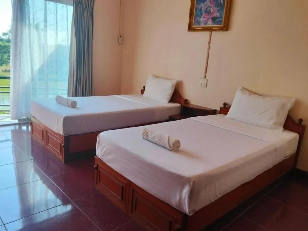 Bed in Rawanda Resort Hotel