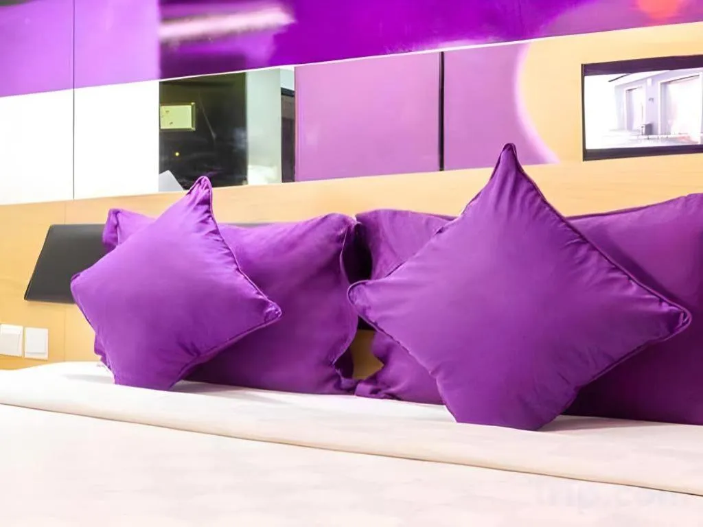 Bed in G Suites Hotel By AMITHYA