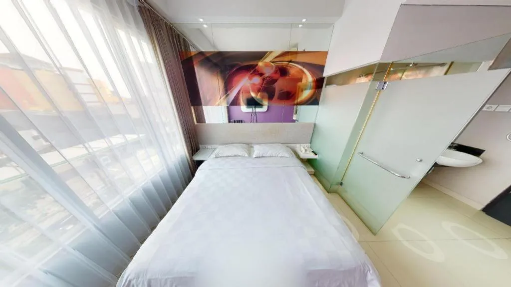 Bed in G Suites Hotel By AMITHYA