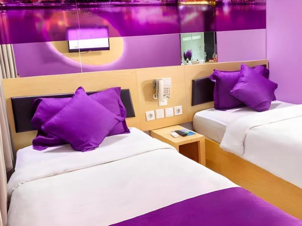 Bed in G Suites Hotel By AMITHYA