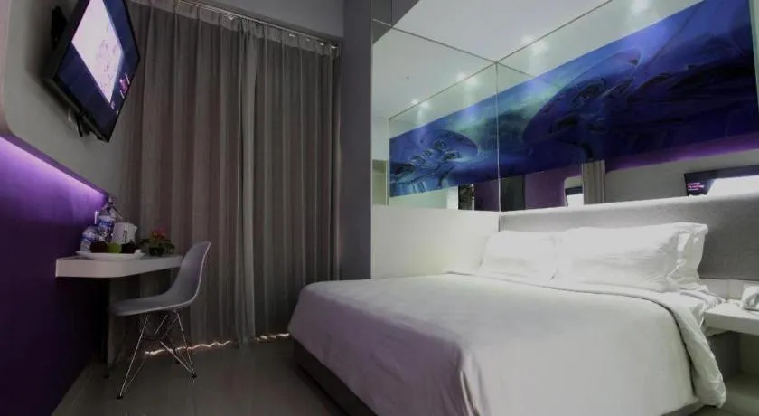 Bed in G Suites Hotel By AMITHYA