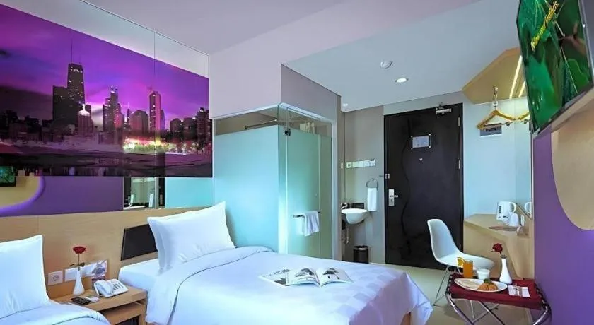 Bed in G Suites Hotel By AMITHYA