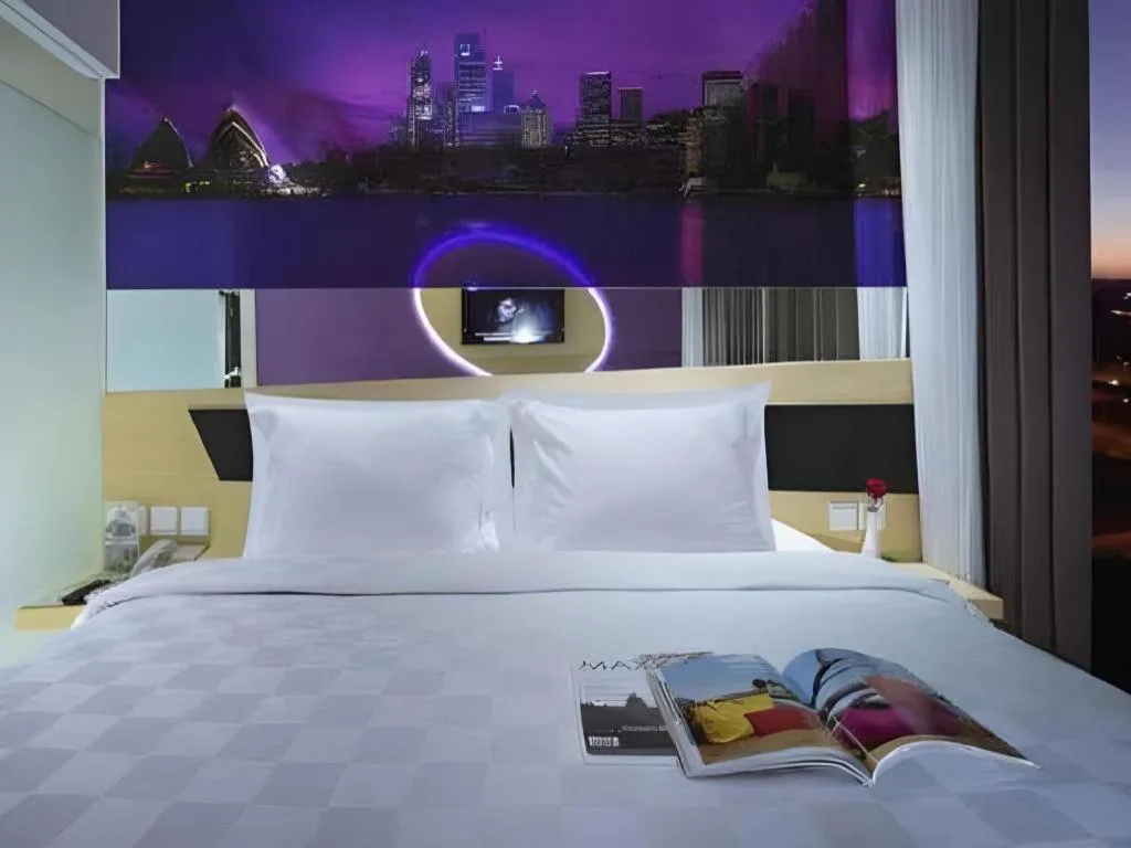 Bed in G Suites Hotel By AMITHYA