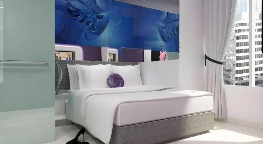 Bed in G Suites Hotel By AMITHYA