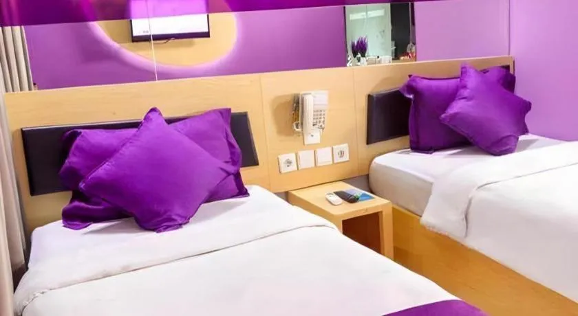 Bed in G Suites Hotel By AMITHYA