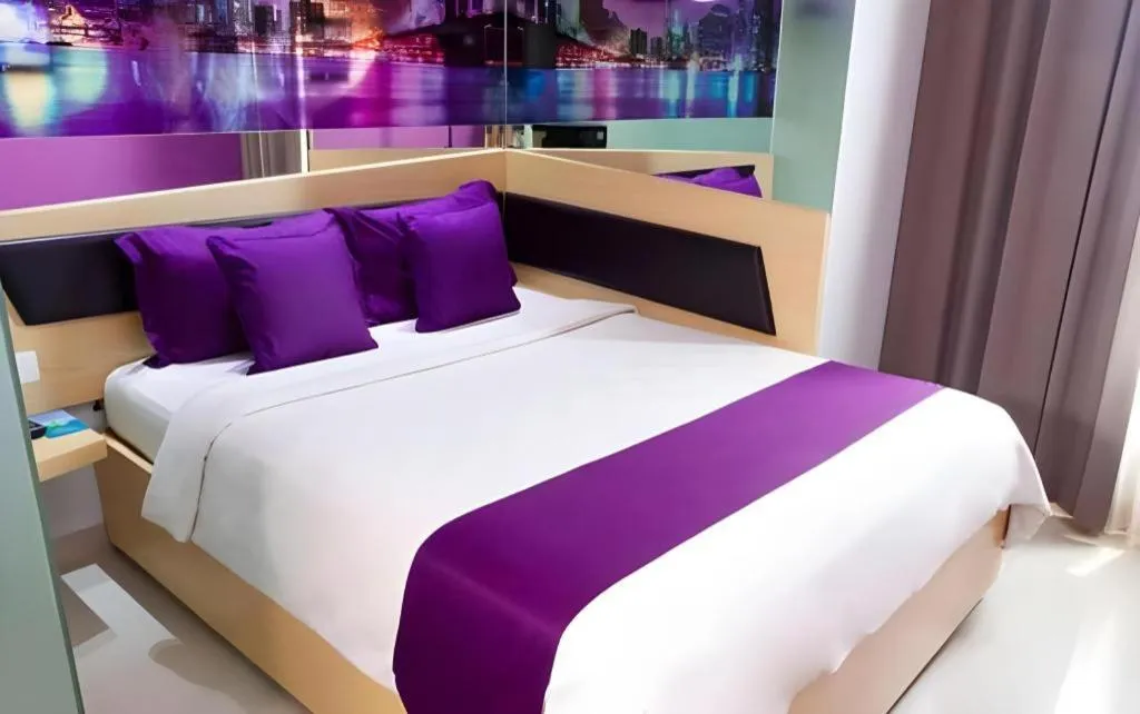 Bed in G Suites Hotel By AMITHYA