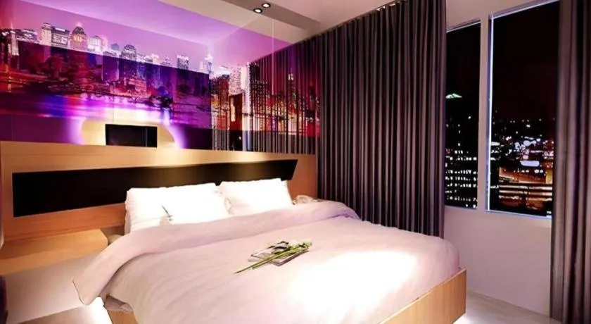 Bed in G Suites Hotel By AMITHYA