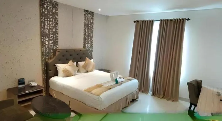 Bed in HW Hotel Padang