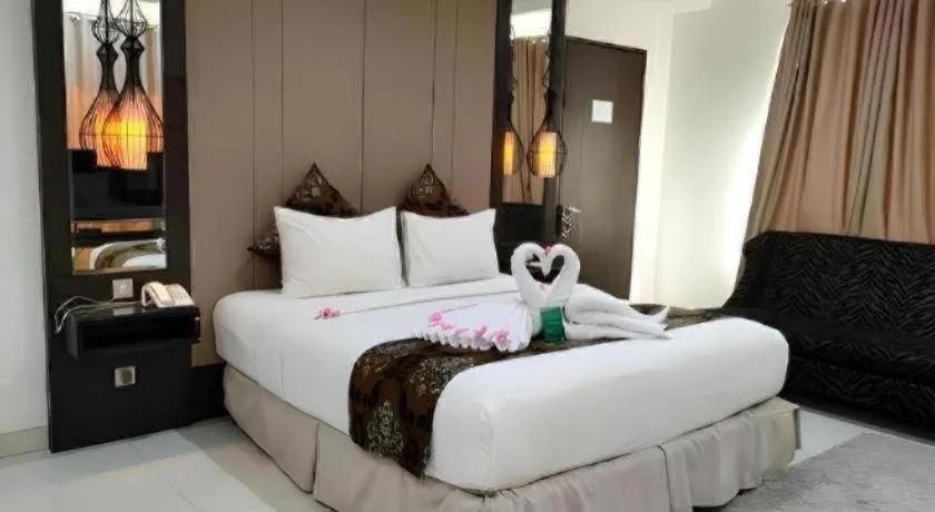 Bed in HW Hotel Padang