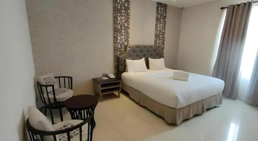 Bed in HW Hotel Padang