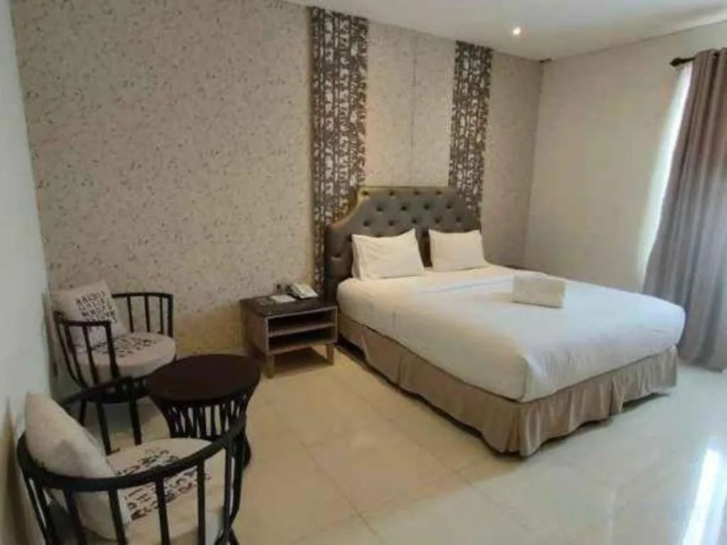 Bed in HW Hotel Padang