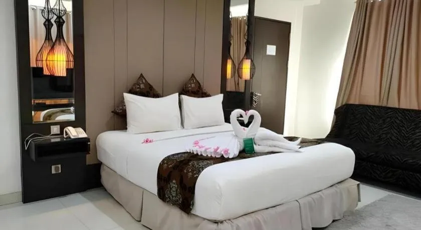 Bed in HW Hotel Padang