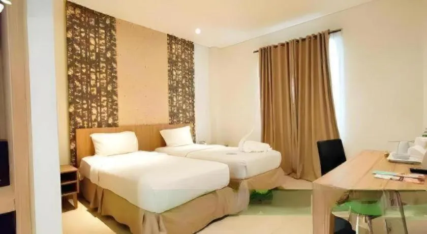 Bed in HW Hotel Padang