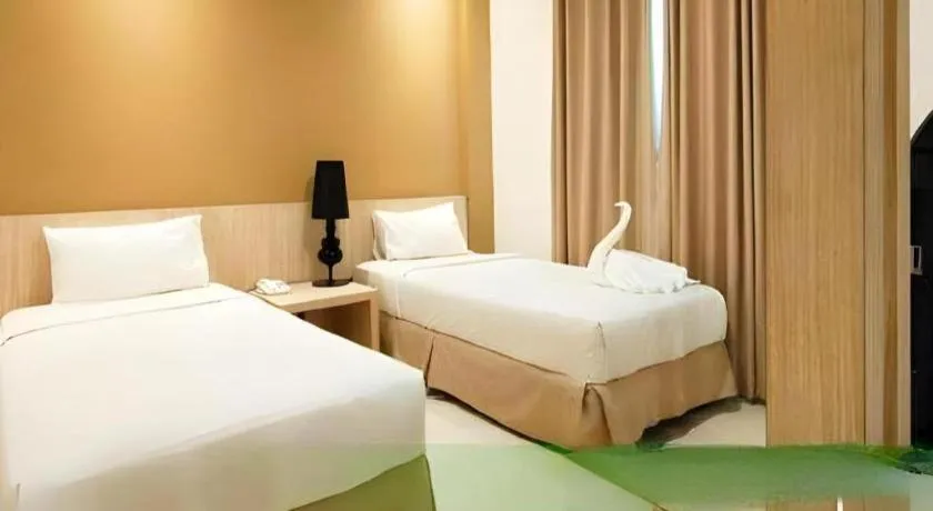 Bed in HW Hotel Padang