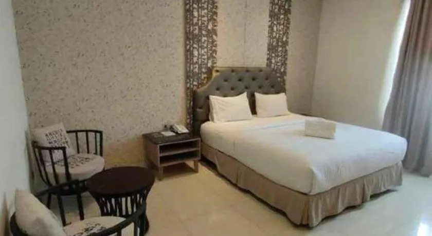 Bed in HW Hotel Padang