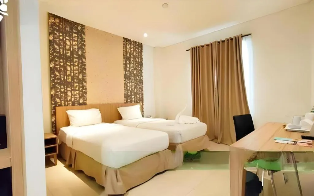 Bed in HW Hotel Padang