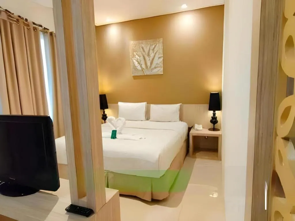 Bed in HW Hotel Padang