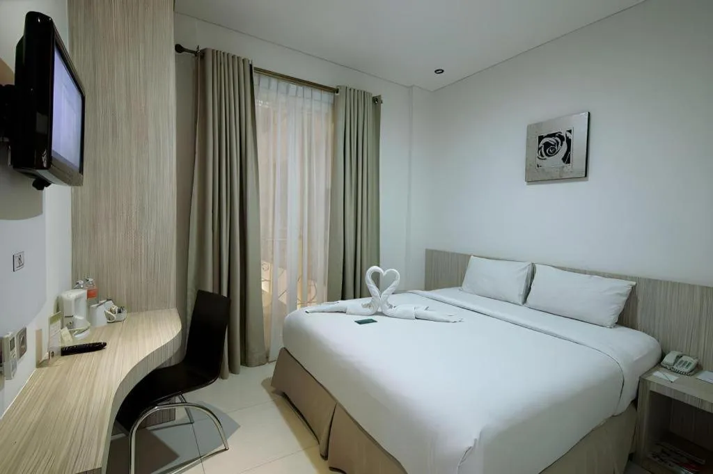 Bed in HW Hotel Padang