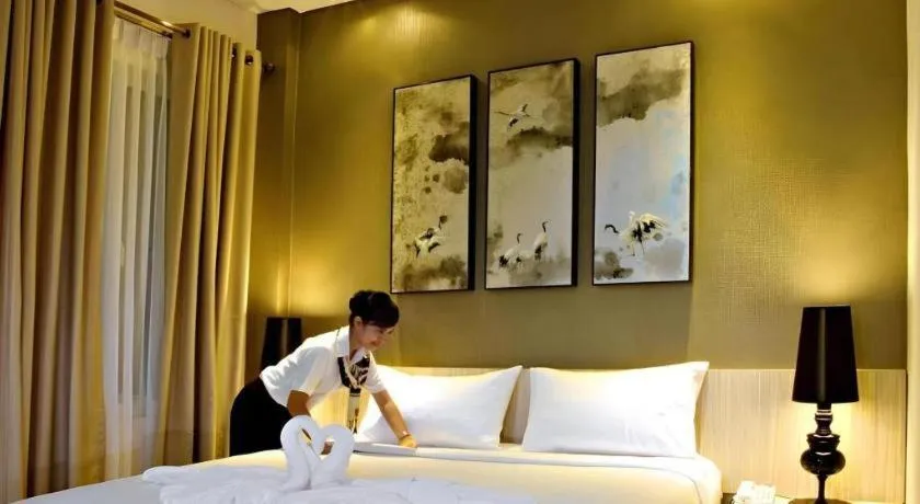 Bed in HW Hotel Padang