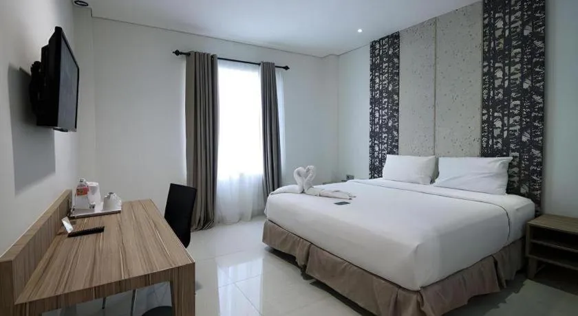 Bed in HW Hotel Padang