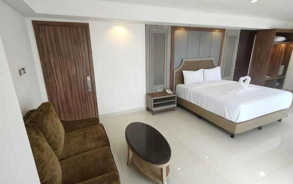 Bed in HW Hotel Padang