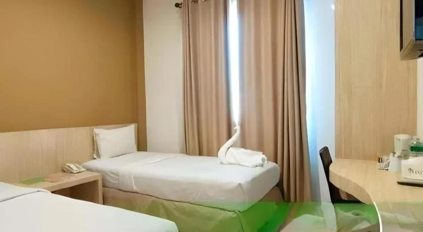 Bed in HW Hotel Padang