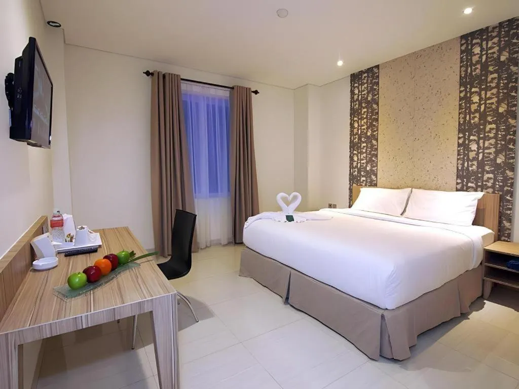 Bed in HW Hotel Padang