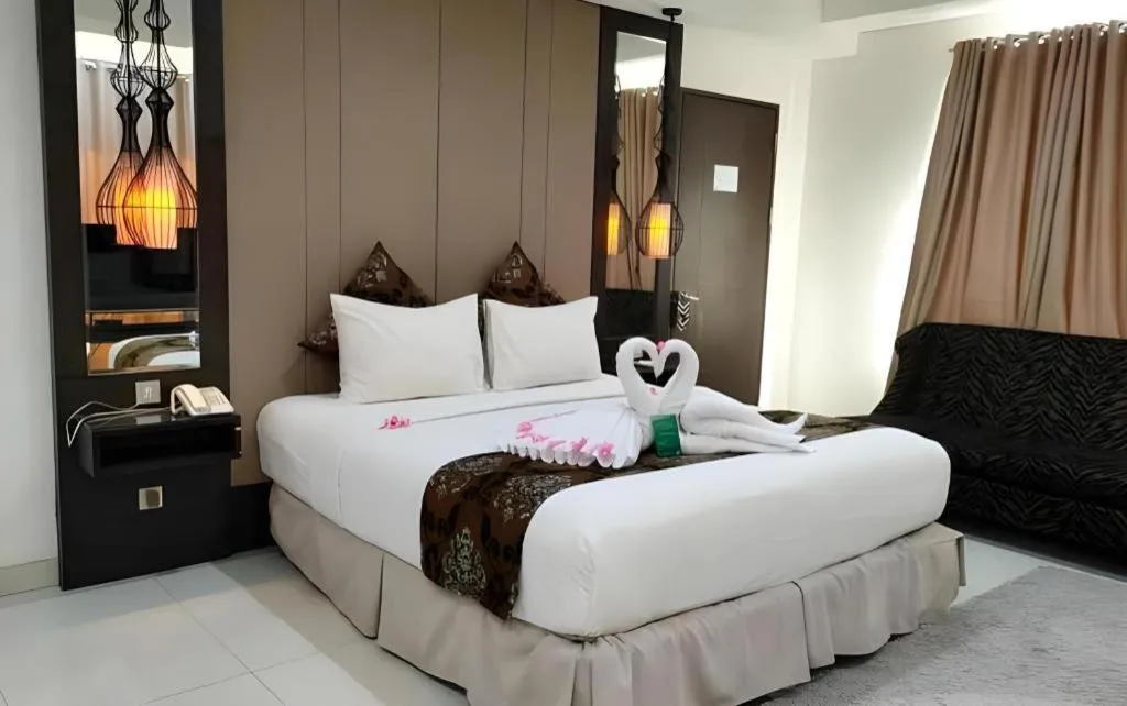 Bed in HW Hotel Padang