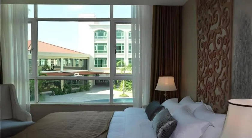 Bed in San Jiang Grand Hotel