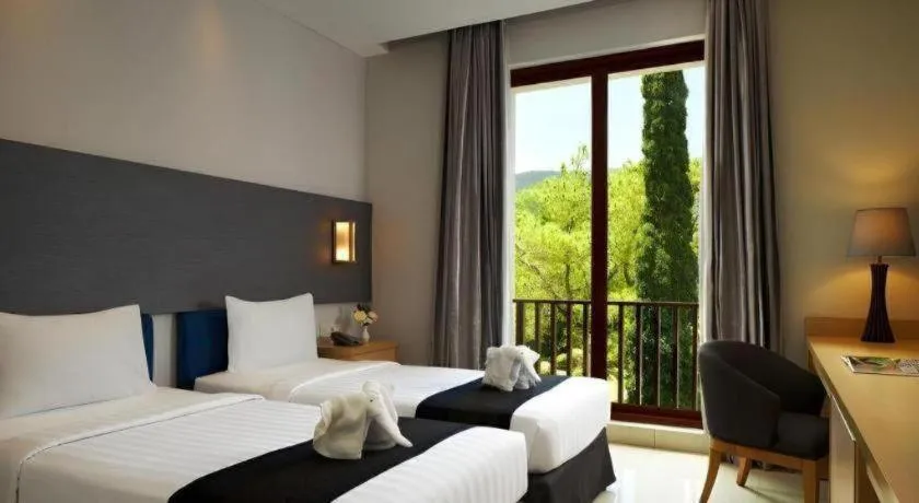 Bed in eL Hotel Kartika Wijaya Batu