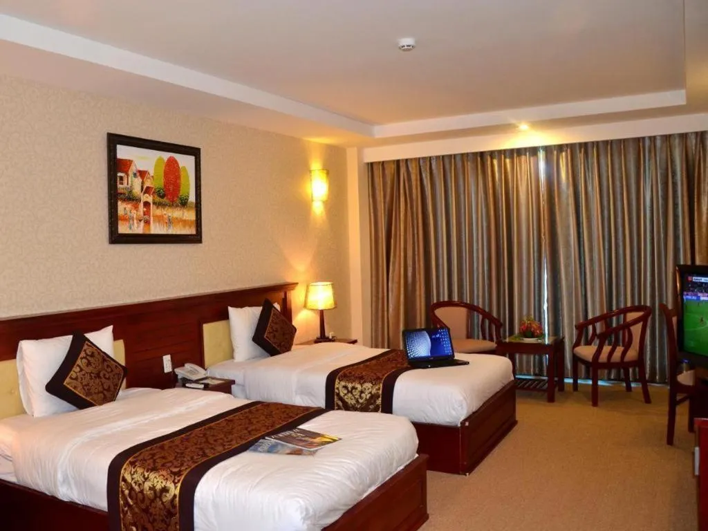 Bed in Tan Binh Hotel