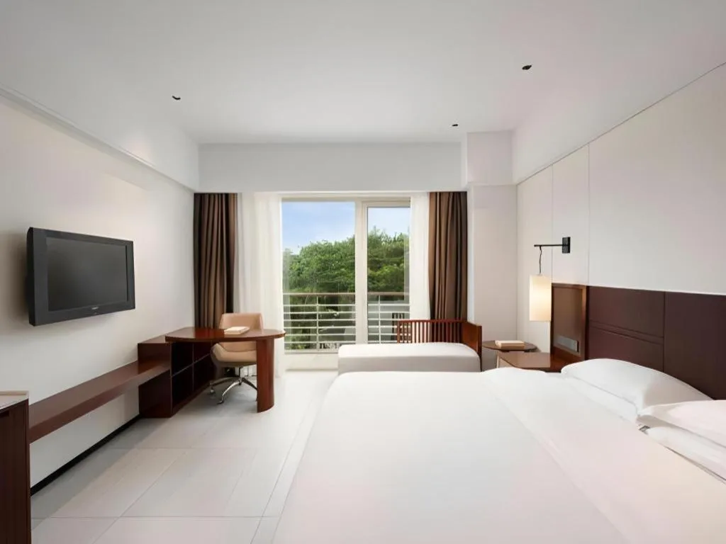 Bed in Grand Soluxe Hotel and Resort Sanya