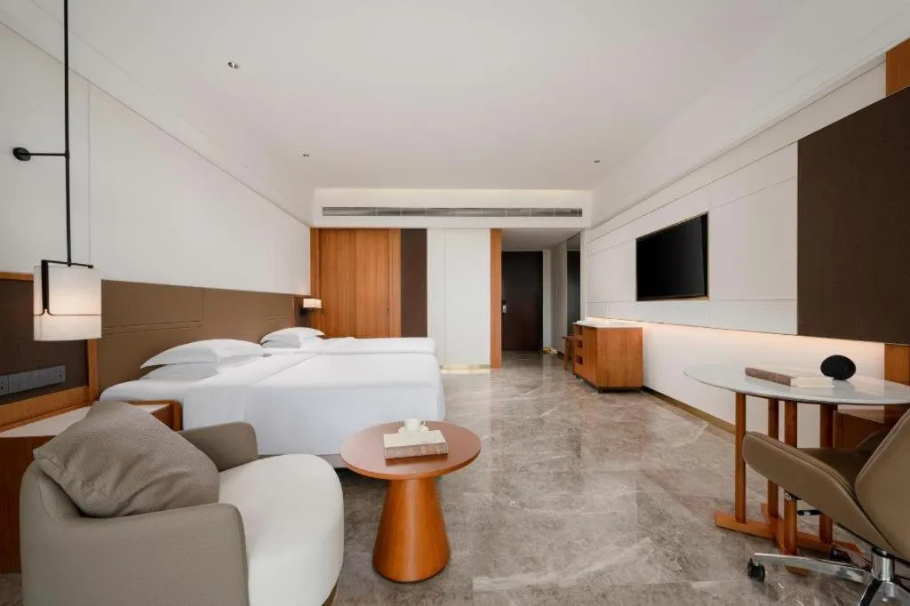 Bed in Grand Soluxe Hotel and Resort Sanya