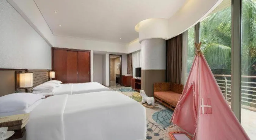 Bed in Grand Soluxe Hotel and Resort Sanya