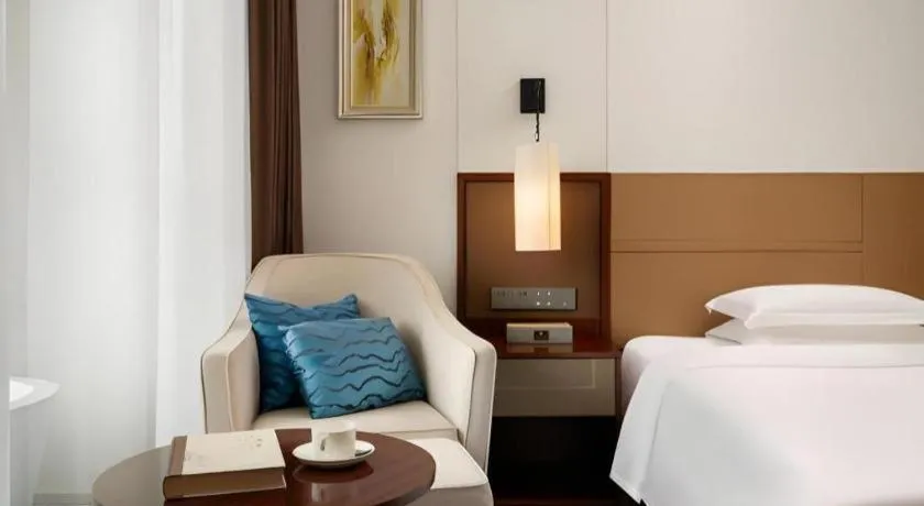 Bed in Grand Soluxe Hotel and Resort Sanya