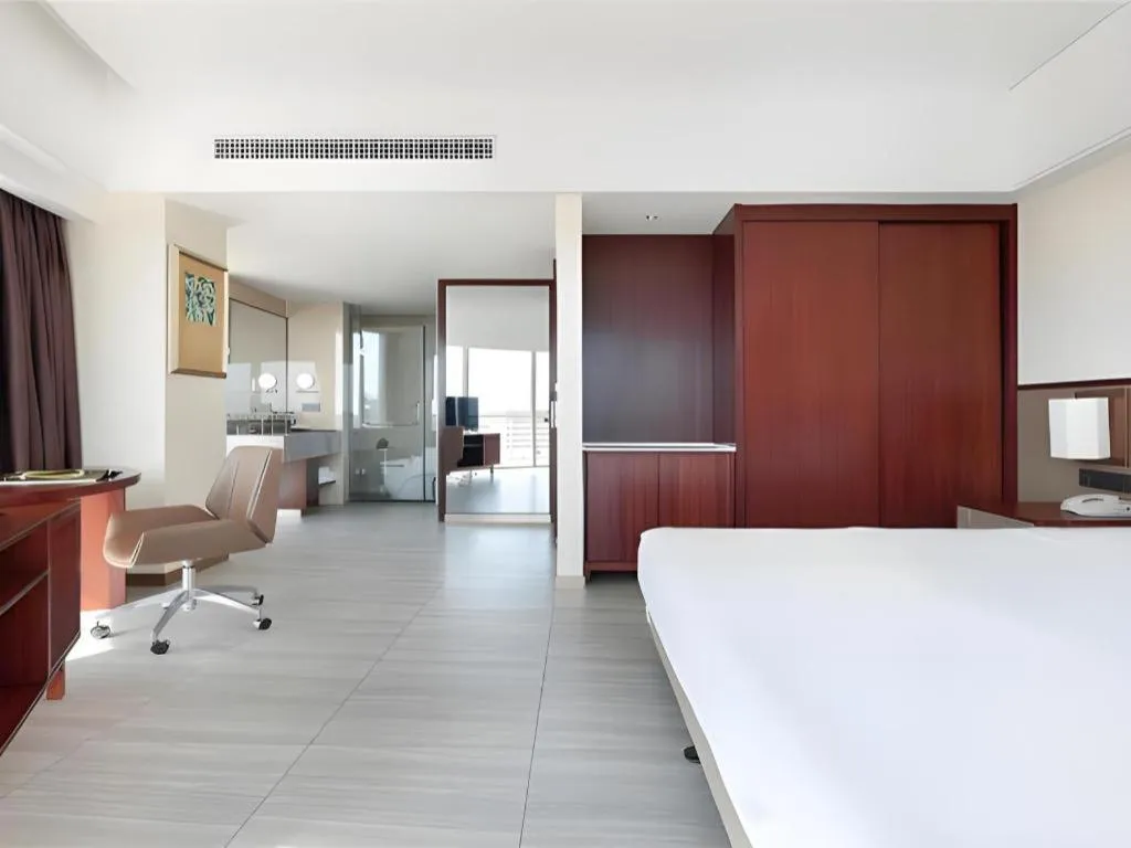 Bed in Grand Soluxe Hotel and Resort Sanya