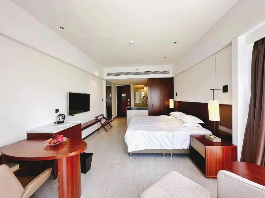 Bed in Grand Soluxe Hotel and Resort Sanya