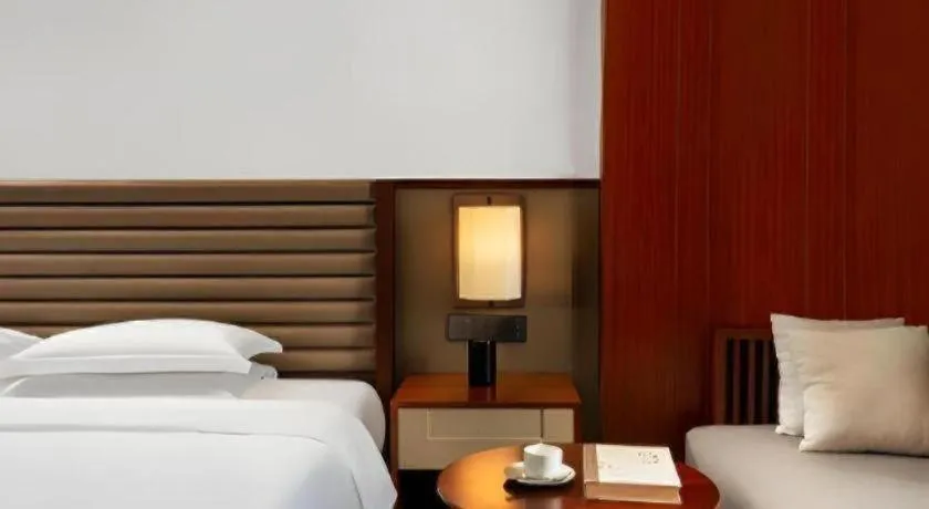 Bed in Grand Soluxe Hotel and Resort Sanya