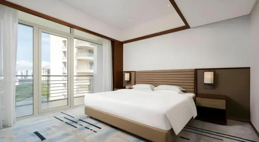 Bed in Grand Soluxe Hotel and Resort Sanya