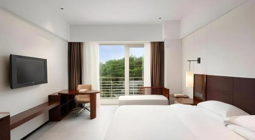 Bed in Grand Soluxe Hotel and Resort Sanya