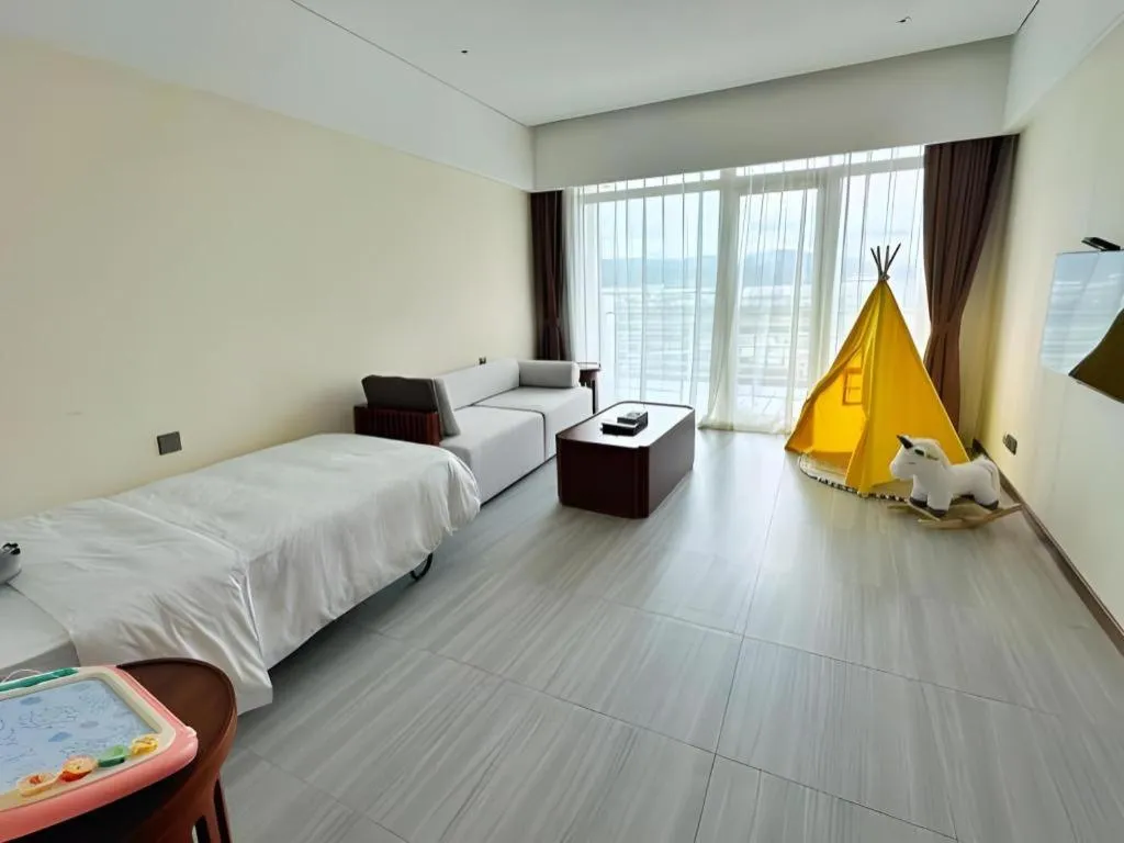 Bed in Grand Soluxe Hotel and Resort Sanya