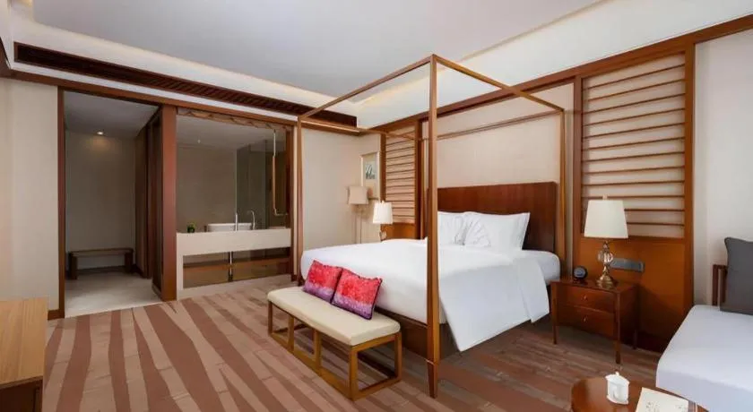 Bed in Grand Soluxe Hotel and Resort Sanya