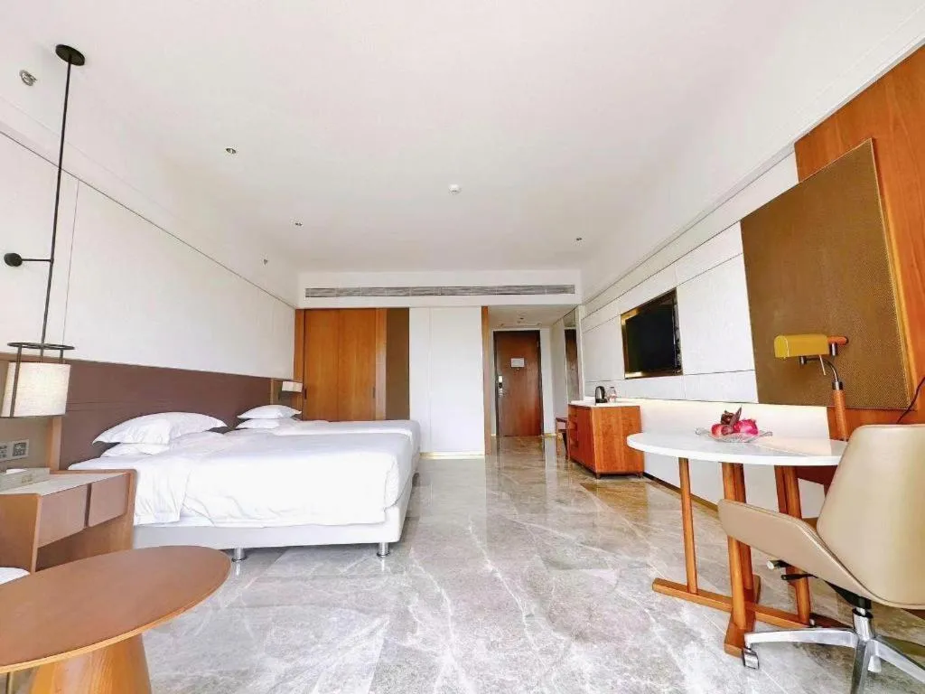 Bed in Grand Soluxe Hotel and Resort Sanya