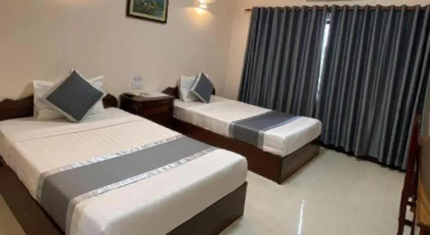 Bed in Asian Koh Kong Hotel