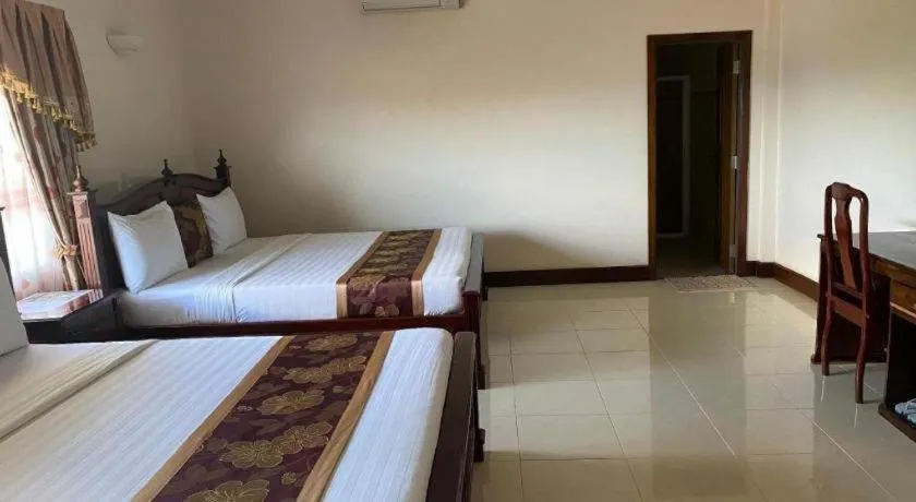 Bed in Asian Koh Kong Hotel